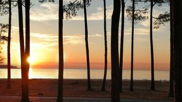 On the beach, sun-loungers, beach towels