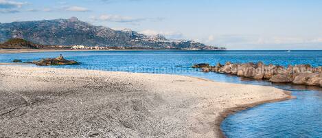 On the beach, sun loungers