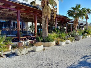 Outdoor dining - VILLA ARYA with private heated pool, gym, sauna, roof hot tub near the sea. (Podstrana)