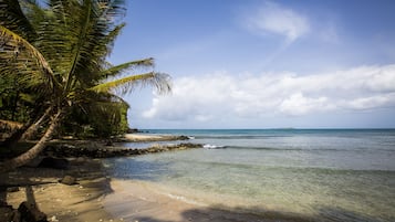 On the beach, sun loungers, beach towels
