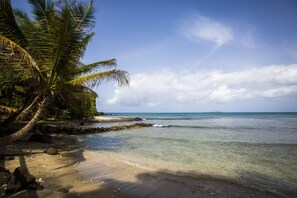 On the beach, sun loungers, beach towels