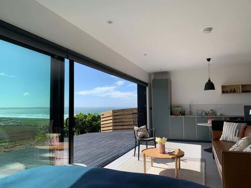 5-Bed Coastal Retreat w/ Studio, Sauna & Sea Views