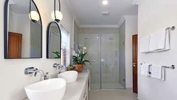 Bathtub, hair dryer, towels, soap