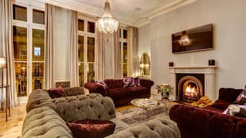 Smart TV, fireplace, books