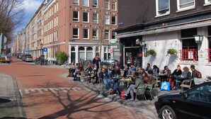 A group of people sitting outside a building with a sign that reads "De Vle". - Lovely apartment (2 guests) in city centre Amsterdam -private -quiet -luxurious (Amsterdam)