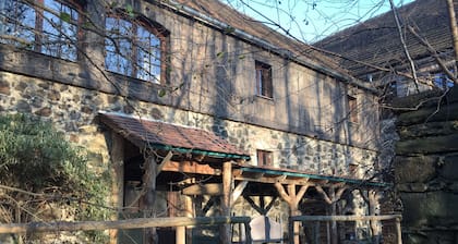 Appartement isolé au-dessus des écuries dans une maison de moulin historique