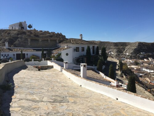 Cave House with a spectacular view of the village and across to Sagra