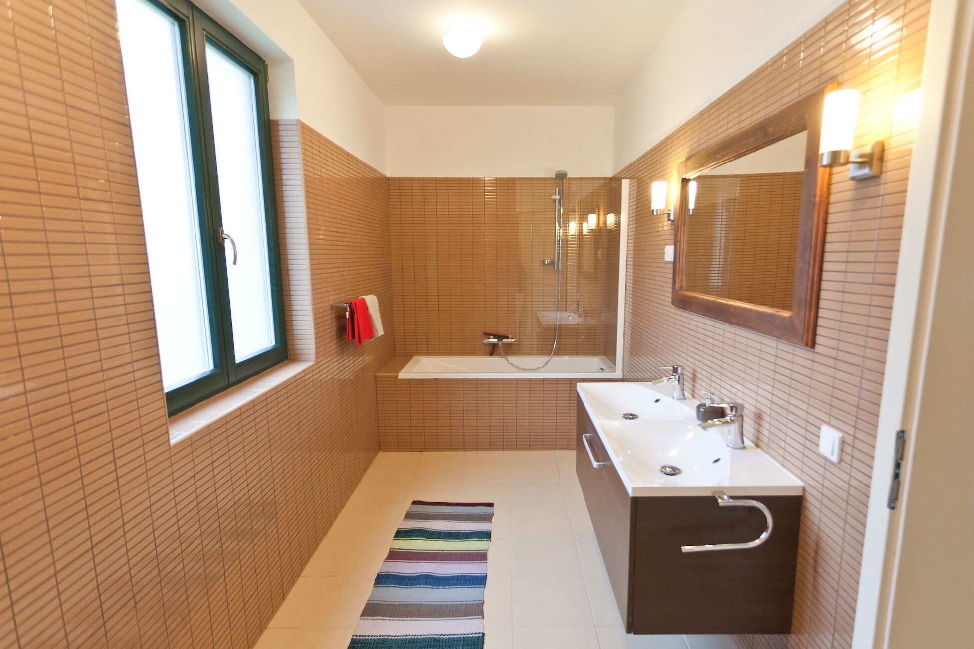 Combined shower/tub, hair dryer, towels, toilet paper