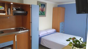 Planxa i posts de planxar, wifi i roba de llit 