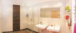 Shower, hair dryer, towels, soap