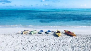 On the beach, sun-loungers