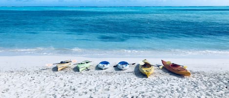 On the beach, sun-loungers