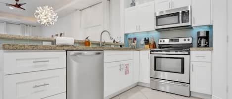 Coffee/tea maker, fridge, microwave, oven