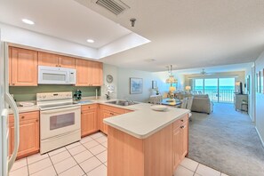 Fridge, microwave, oven, stovetop - Sea Oats 103 is a Silver 3 - bedroom 2 bath Gulf Front Condo (Redington Shores)