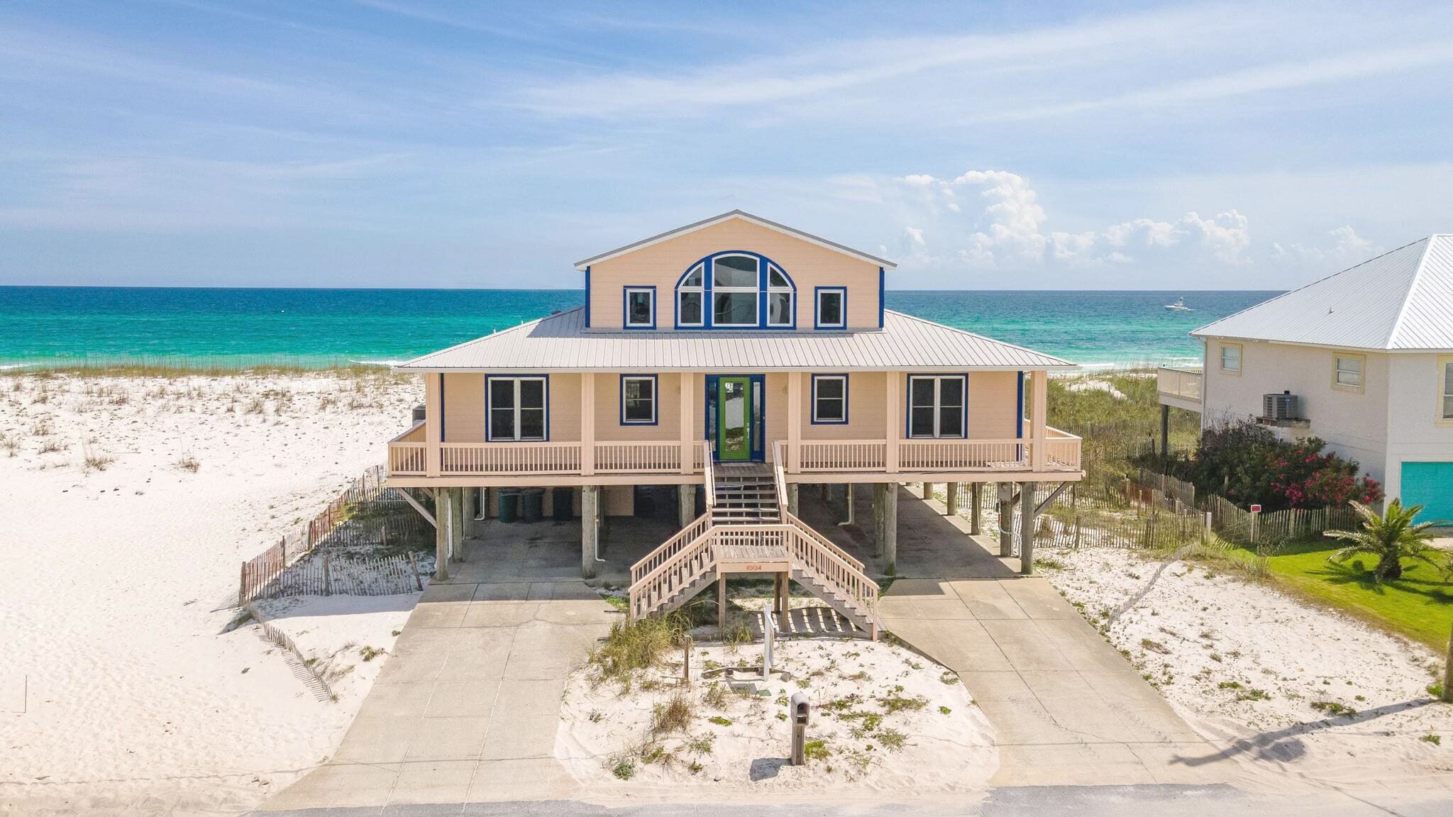 Spacious kitchen and living area. Enjoy Gulf front dining on outside deck.