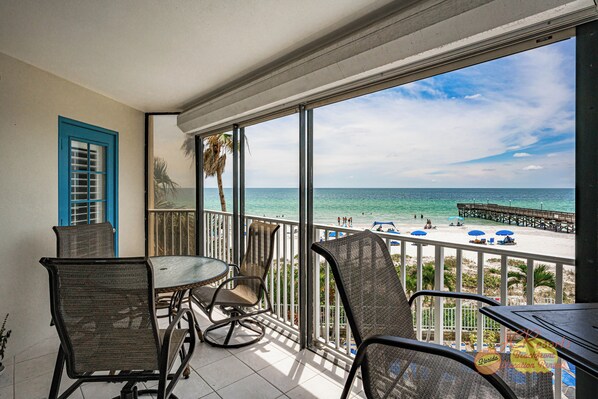 Outdoor dining - Beach Palms 209 beautiful Gulf Front Corner 2nd floor vacation rental (Indian Shores)