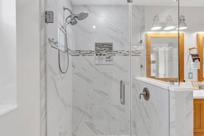 Combined shower/tub, hair dryer, towels, shampoo