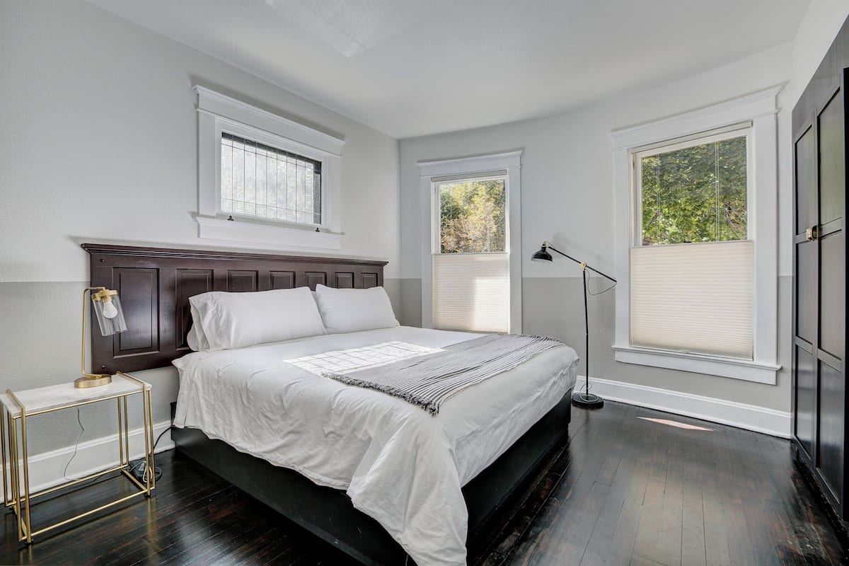Premium bedding, desk, laptop workspace, soundproofing