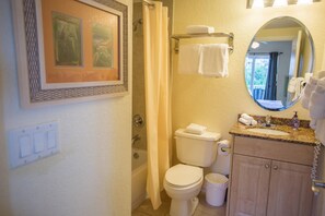 Combined shower/tub, hair dryer, towels, shampoo