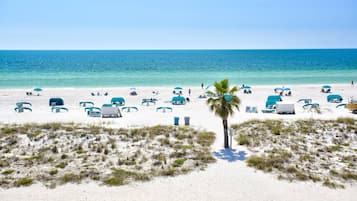 On the beach, beach towels, motor boating