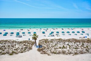 On the beach, beach towels, motor boating