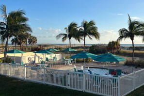 Outdoor dining - Treasure Island Premier Resort. Beautiful Pools. On Site Cafe. Gulf View. Great Value! (Treasure Island)