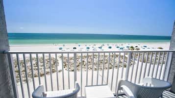 On the beach, beach towels, motor boating