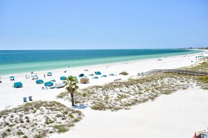 On the beach, beach towels, motor boating