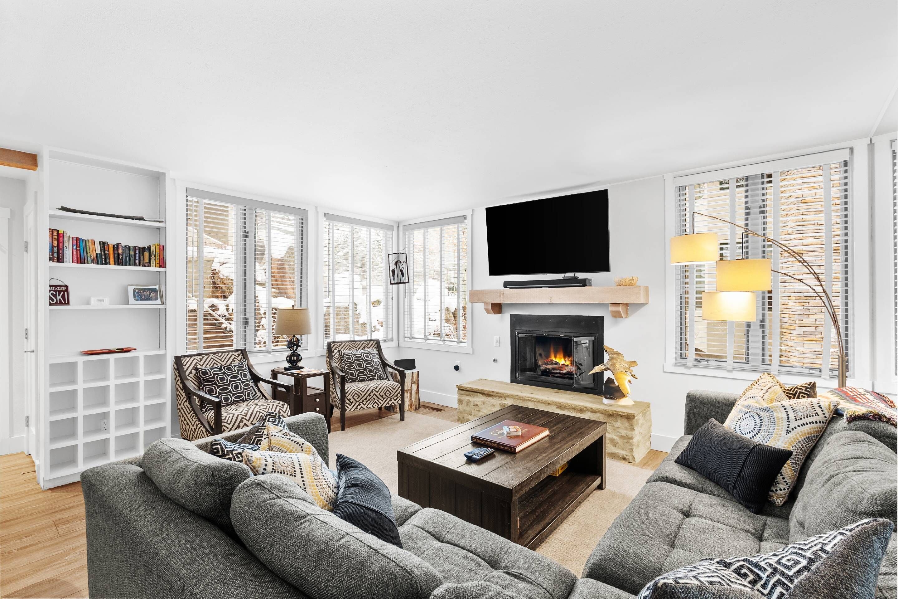 This professionally decorated living room is an inviting place for your group to relax in front of the gas fireplace and flat screen TV.