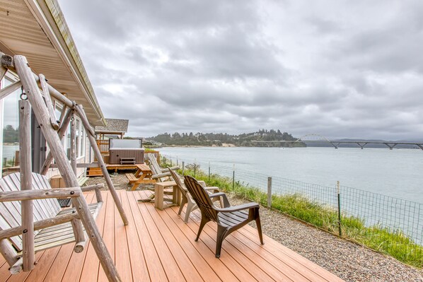 Terrace/patio - Dog-Friendly Bayfront Home with Private Hot Tub, Water & Bridge Views, Free WiFi (Waldport)