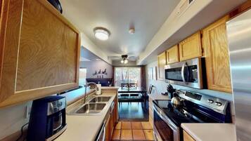 Coffee/tea maker, fridge, microwave, oven