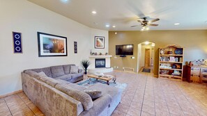 Smart TV, fireplace, DVD player, books