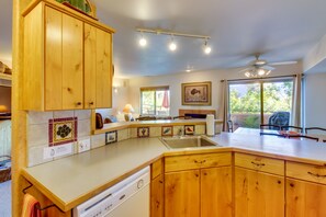 Fridge, microwave, oven, stovetop - Dog-Friendly Condo on Golf Course with Free WiFi & Seasonal Pool (Moab)