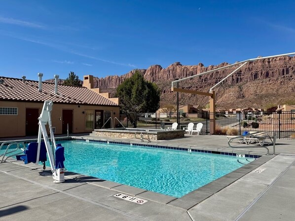 A heated pool - Spacious, family-friendly home near downtown with seasonal pool & hot tub (Moab)