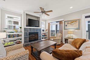 Smart TV, fireplace, DVD player, books