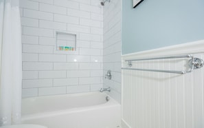 Combined shower/bathtub, hair dryer, towels - Modern Amenities in Historic Gaston St. Home w/ Courtyard by Lucky Savannah (Savannah)