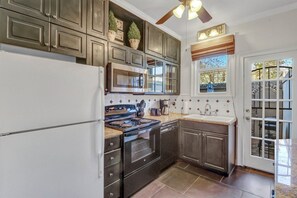 Fridge, microwave, oven, stovetop - Dog Friendly Historic Home by Forsyth w/ Private Courtyard by Lucky Savannah (Savannah)