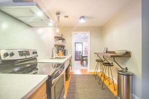Fridge, microwave, oven, stovetop - Charming Gordon Street Retreat with Courtyard & Parking by Lucky Savannah (Savannah)