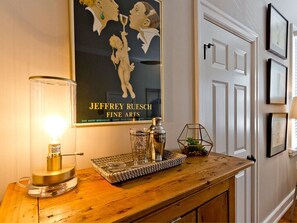 Classic decor and artwork adorn this elegant hallway.