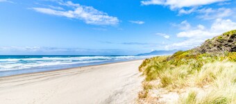 Elegant, oceanfront condo with deck & extraordinary views - dog-friendly