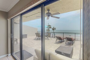 Terrace/patio - Large Private Balcony with Beach View! Beachfront, Pool, Hot Tub, Grill, and Close to Restaurants (Madeira Beach)