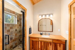 Combined shower/tub, hair dryer, towels, soap