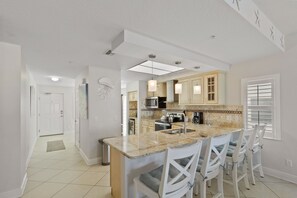 Fridge, microwave, oven, stovetop - Luxury Direct Beachfront Views - Crimson #201 (Madeira Beach)
