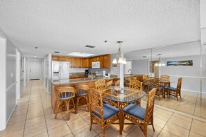 Enjoy cooking in the well-equipped kitchen with a central island and dining area.