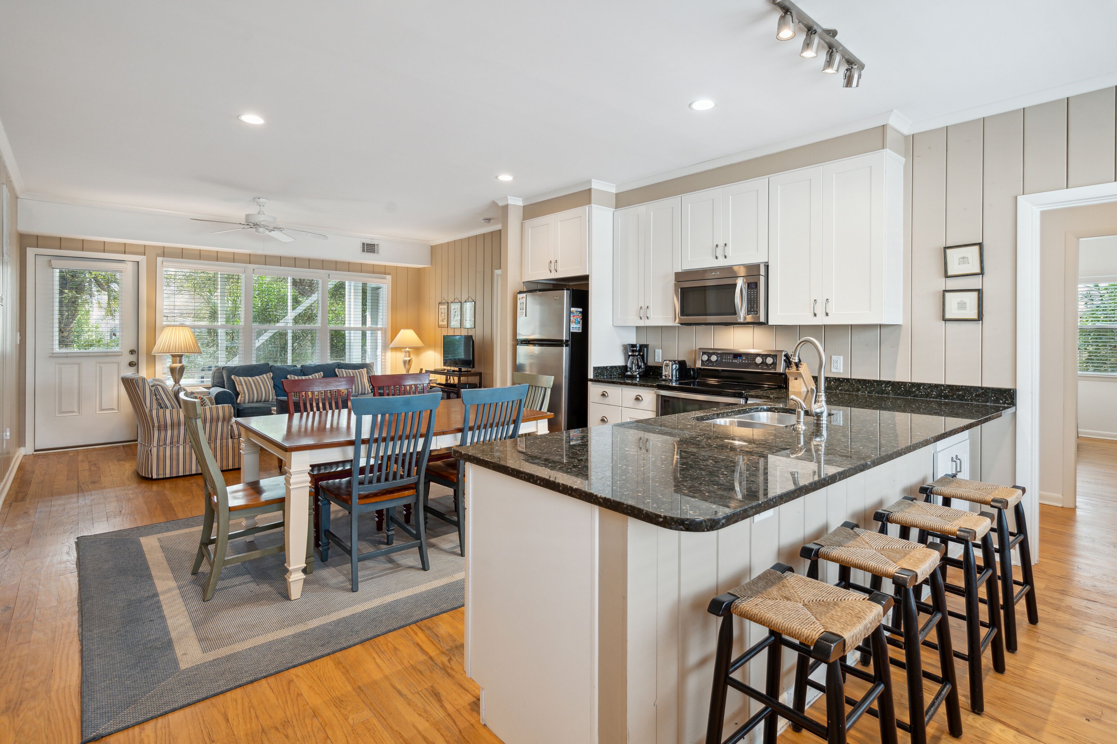 Walk to beach, screened porch, single level, updated kitchen and baths!