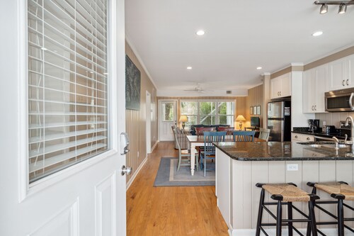 Walk to beach, screened porch, single level, updated kitchen and baths!