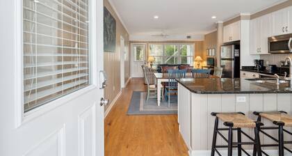 Walk to beach, screened porch, single level, updated kitchen and baths!