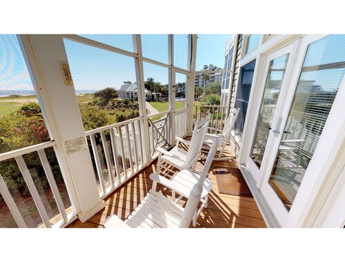 Great home with multiple porches overlooking the 18th fairway in Wild Dunes