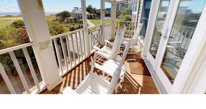 Great home with multiple porches overlooking the 18th fairway in Wild Dunes