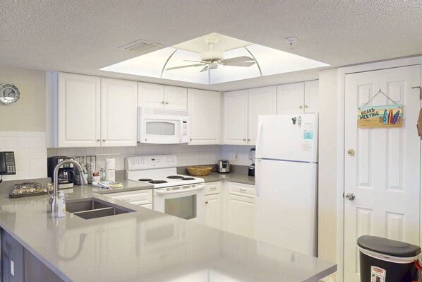 Fridge, microwave, dishwasher, coffee/tea maker